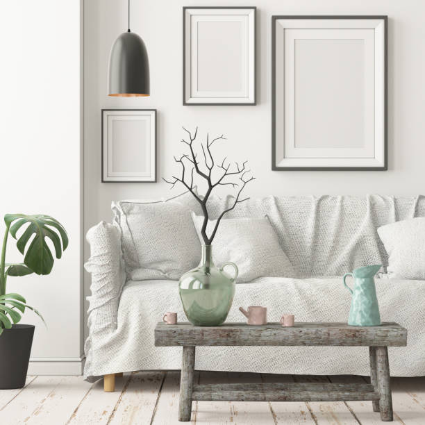istock Mock up poster in an interior in Scandinavian style with a sofa. 3D rendering 1002072304