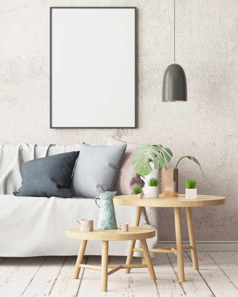 istock Mock up poster in an interior in Scandinavian style with a sofa. 3D rendering 1002072440