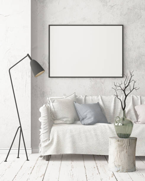 istock Mock up poster in an interior in Scandinavian style with a sofa. 3D rendering 1002072520
