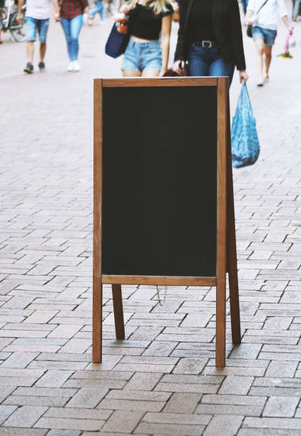 istock blank blackboard chalkboard advertising sign board or customer stopper 1002079198
