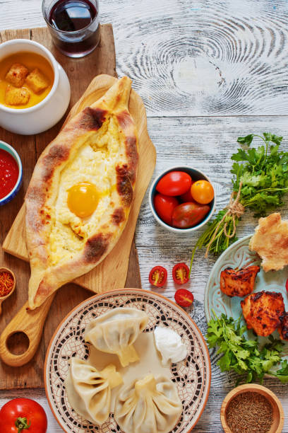 istock Top view of traditional Georgian meal on white table with copy space. 1002086436