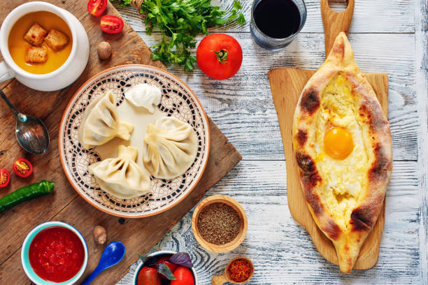 istock Top view of traditional dishes from Georgia on white table 1002086746