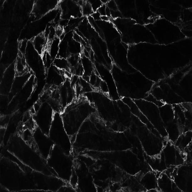 istock Black marble patterned texture background. abstract natural marble black and white for design. 1002090880