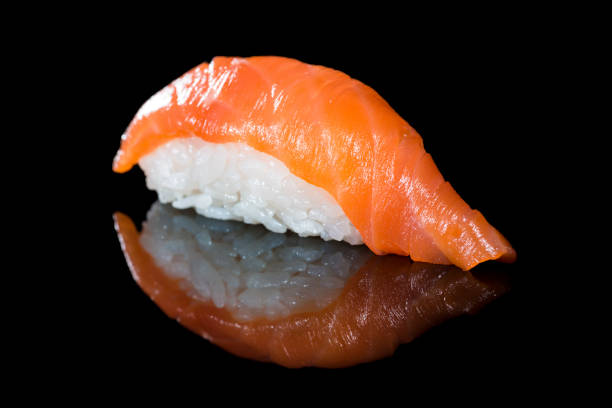 istock Japanese cuisine. Appetizing salmon and rice 1002091434