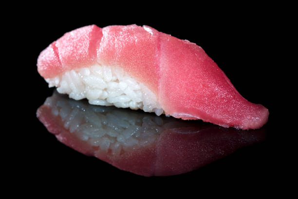istock Japanese cuisine. Appetizing tuna and rice 1002091460