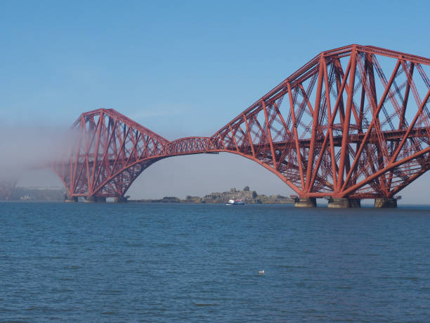 istock Forth Bridge over Firth of Forth in Edinburgh 1002099264