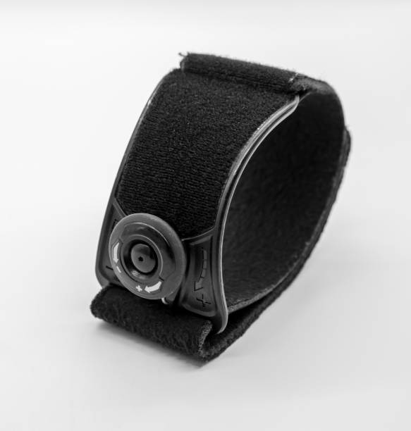 istock Black elbow brace with adjustable button to reduce pain isolated on white background 1002099670