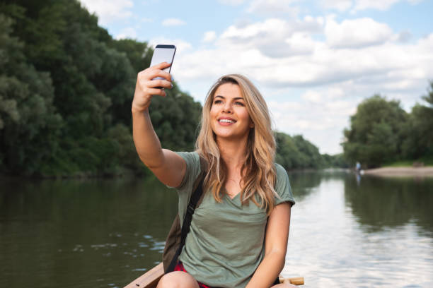 istock Woman in canoe 1002104066