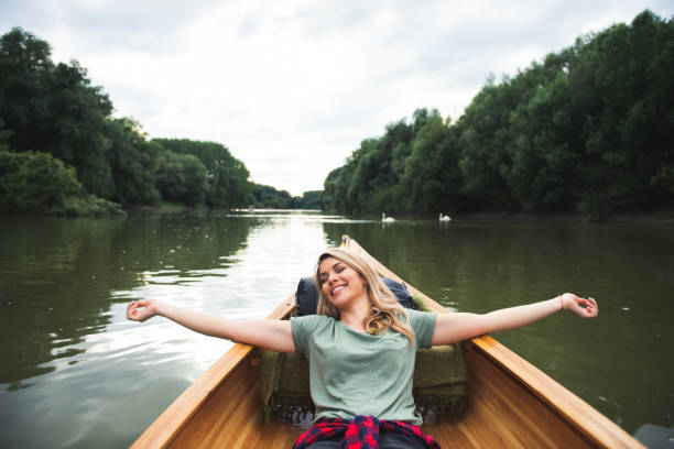 istock Woman in canoe 1002104654