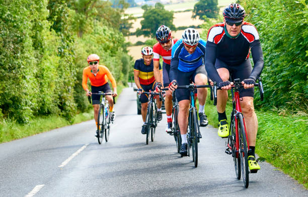 istock Cyclists racing on country roads. 1002107032