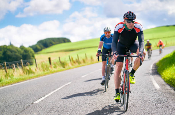 istock Cyclists racing on country roads. 1002107332