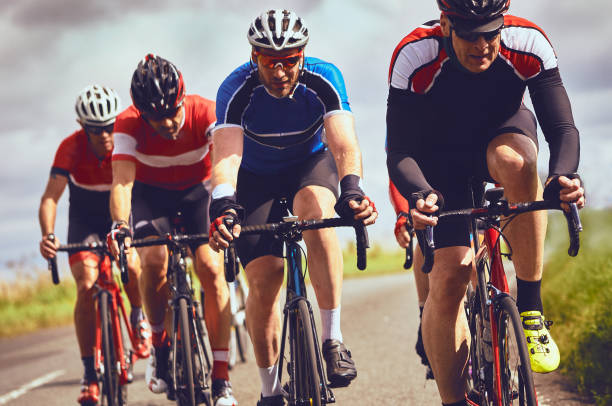 istock Cyclists racing on country roads. 1002108540
