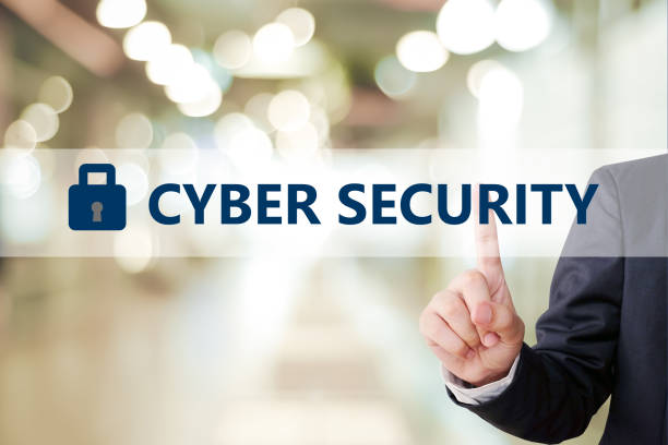 istock Businessman hand touching cyber security device screen over blur background, banner, cyber security concept 1002108842