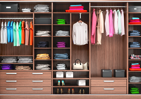 Gran armario con ropa diferente para vestidor. ilustraciones 3D photo
