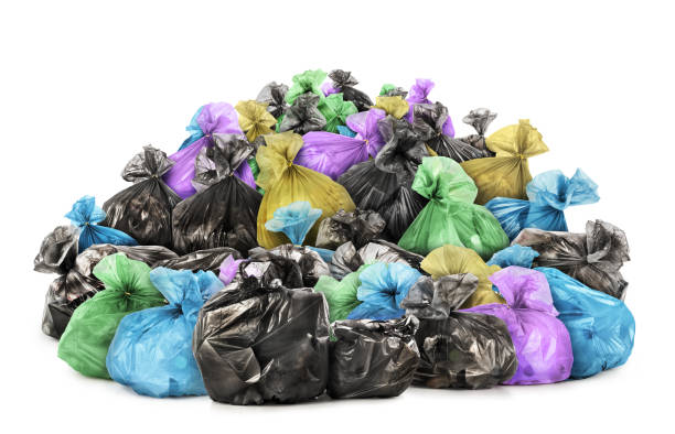 istock Pile of garbage bags isolated on white background 1002114140
