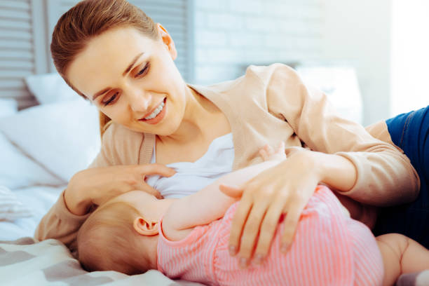 istock Positive delighted female embracing her daughter 1002117208