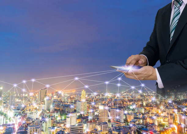 istock Hold the phone concept business network social internet 1002117296