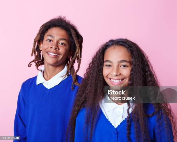 Portrait Of Two Happy Afro Amercian Teenage Students Stock Photo - Download Image Now