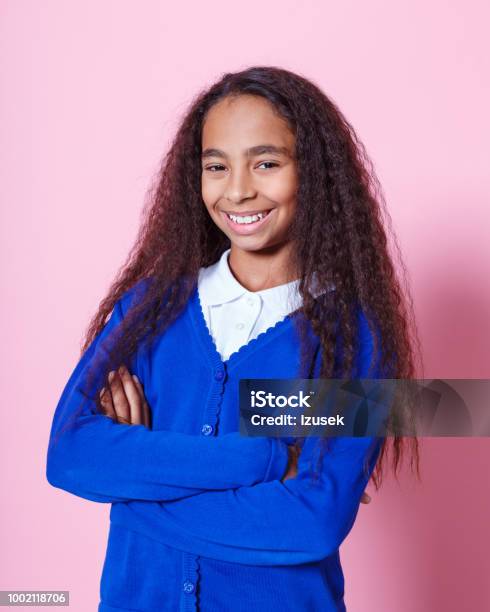 Portrait Of Happy Afro Amercian Schoolgirl Stock Photo - Download Image Now - Teenage Girls, Teenager, Child