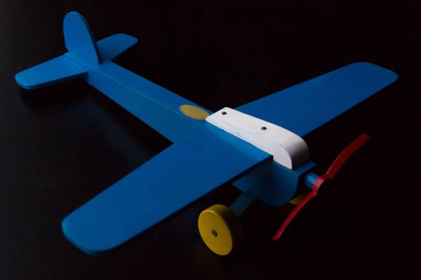 istock Wooden blue toy plane 1002118728