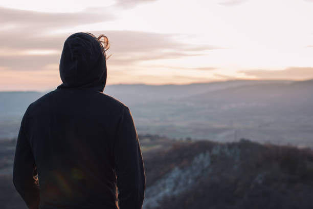 istock Man on top of the mountain 1002121964