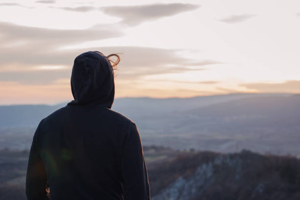 istock Man on top of the mountain 1002122180