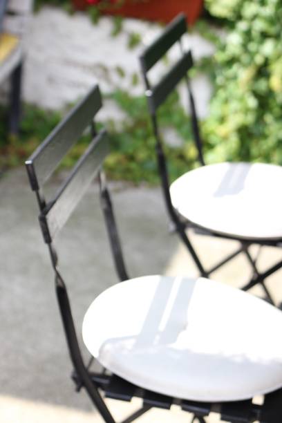 istock Cafe chairs outdoors 1002126198