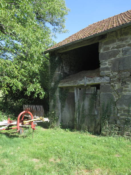 istock Rural Scene  Abandoned farm machine Farm  Landscape 1002132234