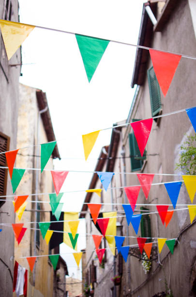 istock Multicolored festive bunting on street 1002135762