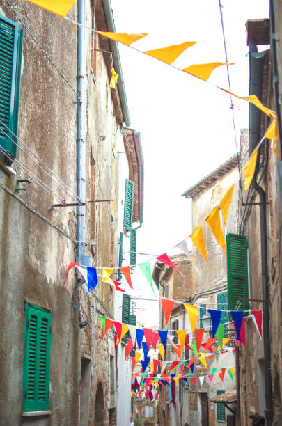 istock Multicolored festive bunting on street 1002135774