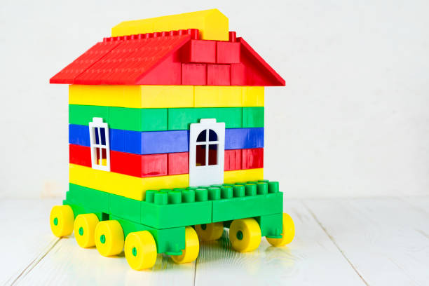 istock Toy house on wheels, a camper from a children's designer 1002136402