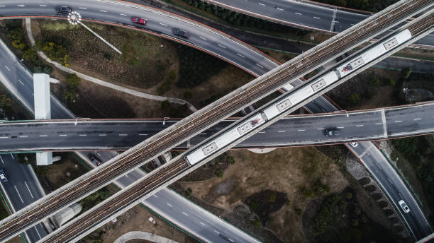 Aerial view of railway, highway and overpass on Luoshan road, Shanghai Aerial view of railway, highway and overpass on Luoshan road, Shanghai maglev train stock pictures, royalty-free photos & images