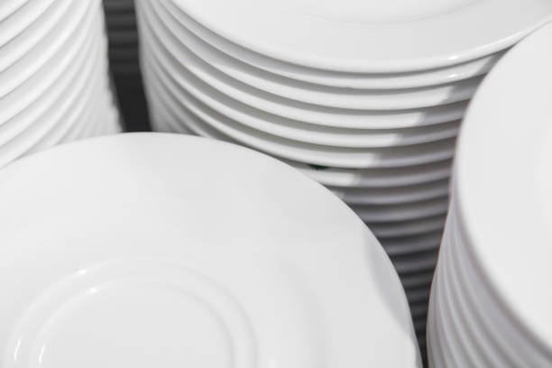 istock Closeup for group of white plates 1002140774