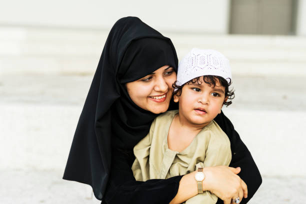 istock Muslim mother and her son 1002143678