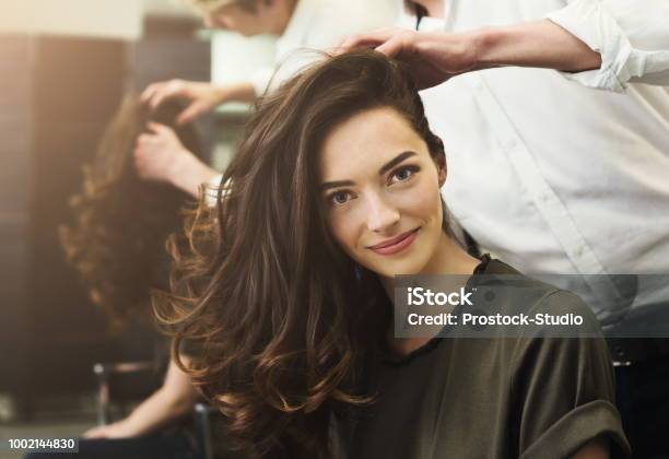 Woman Sitting At Beauty Salon Making Hairdo Stock Photo - Download Image Now - Hair Salon, Hairdresser, Hairstyle
