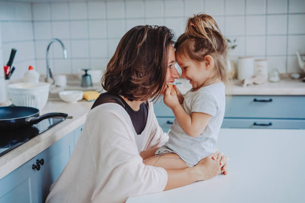 istock Mom and little daughter having fun together 1002148402