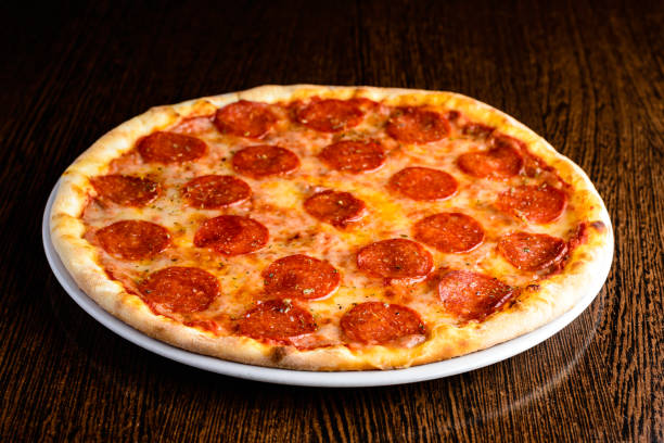 istock Delicious hot homemade Pepperoni pizza 1002149210