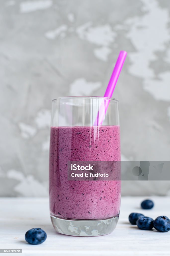 smoothies of fresh fruit in a glass, healthy food Berry and fruit smoothie, healthy juicy vitamin drink diet or vegan food concept, fresh vitamins, homemade refreshing fruit beverage Smoothie Stock Photo