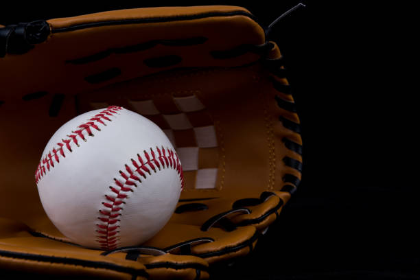 istock New baseball inside a leather catcher's glove 1002153198
