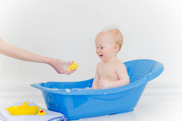 istock Baby boy in a bathroom 1002158092