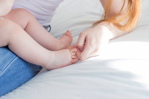 istock Mother with a baby 1002158696
