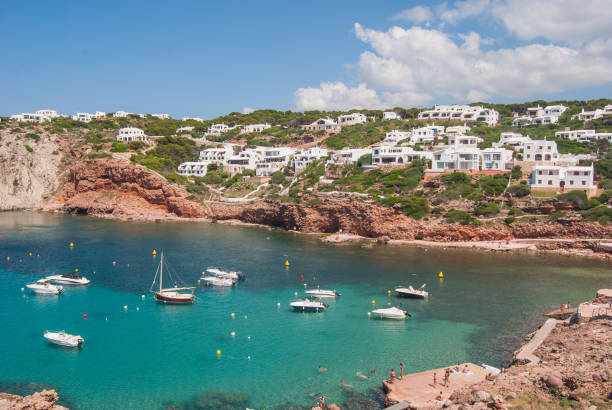 istock Little harbor of Cala Morell in Menorca 1002168686