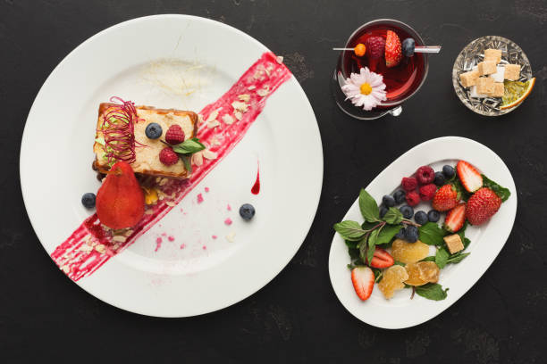 istock Exclusive dessert served on white plate, top view 1002179928