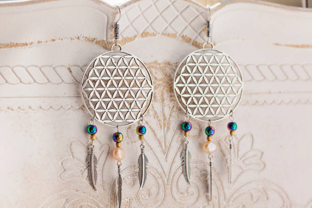 istock Bohemian Earrings on vintage background 1002181622