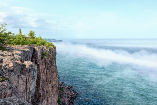 istock Cliff edge along foggy Lake Superior 1002191112
