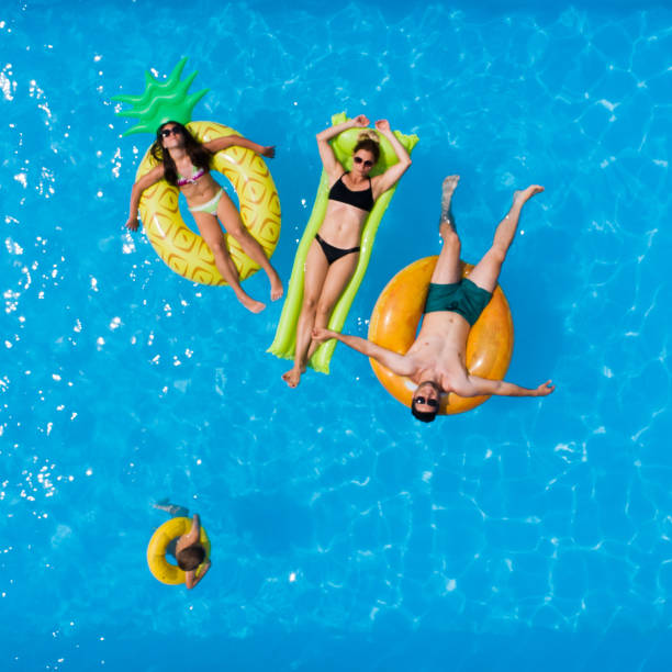 istock Family in the pool 1002194514