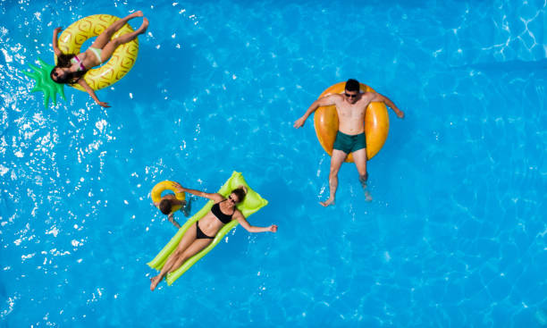 istock Family in the pool 1002194538