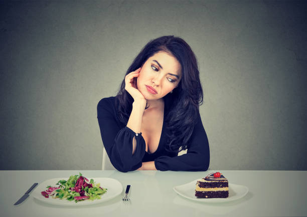 istock Woman craving for sweet dessert 1002195646