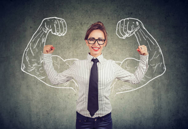 istock Happy powerful young business woman 1002199896