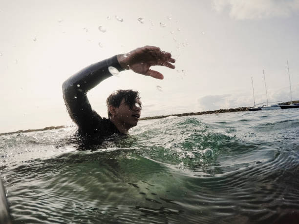 istock Swimming In The Sea 1002207220